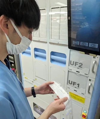 錠剤自動仕分返納装置